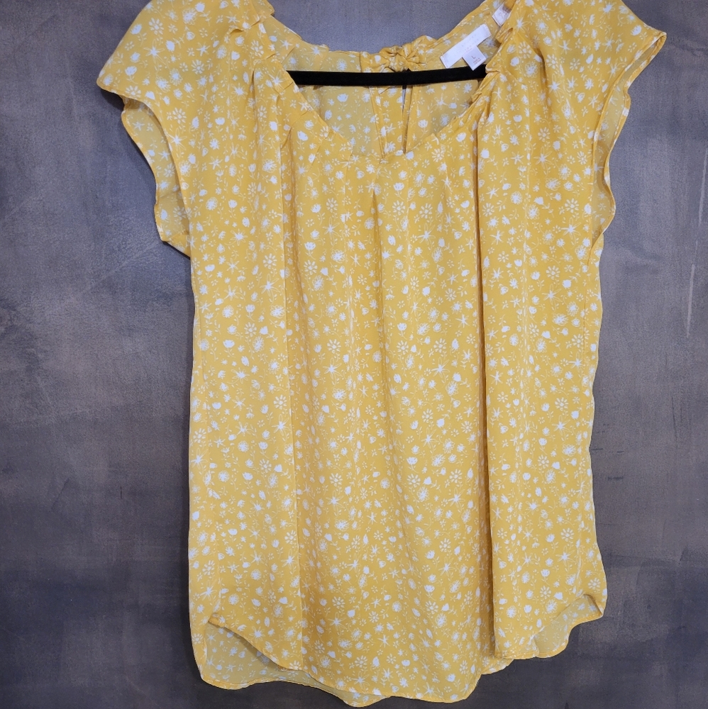 Flowy yellow floral blouse with tie in back